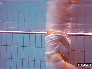 adorable ginger-haired plays nude underwater