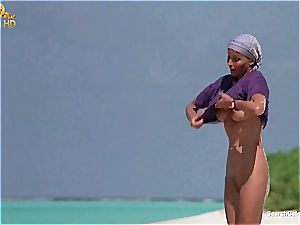 cool Bo Derek flashing off her unshaved poon at the beach