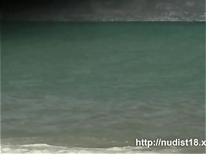 naturist beach spycam shoots nude babes sunbathing